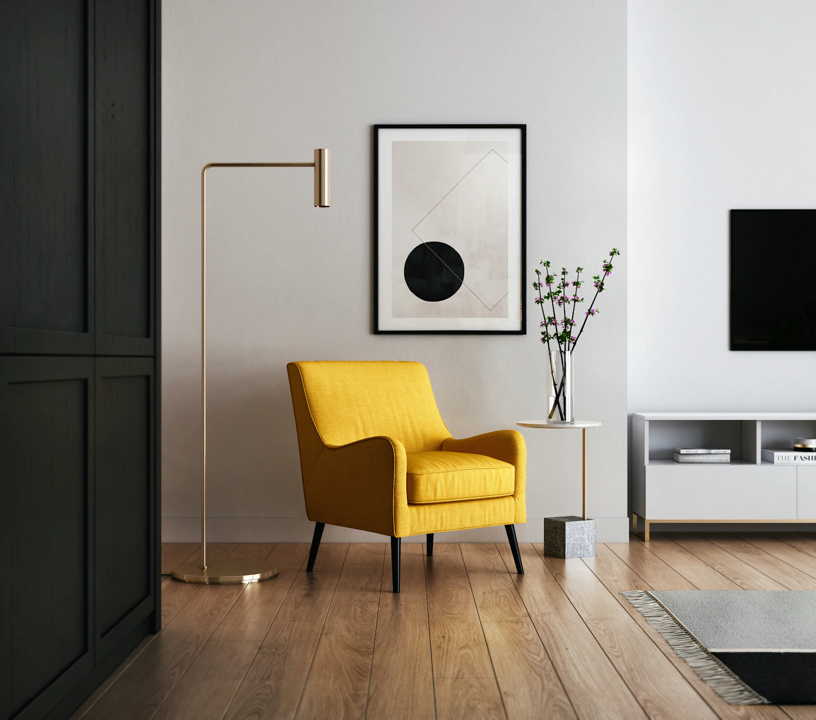 Sala com cadeirão amarelo, candeeiro de pé e quadro na parede